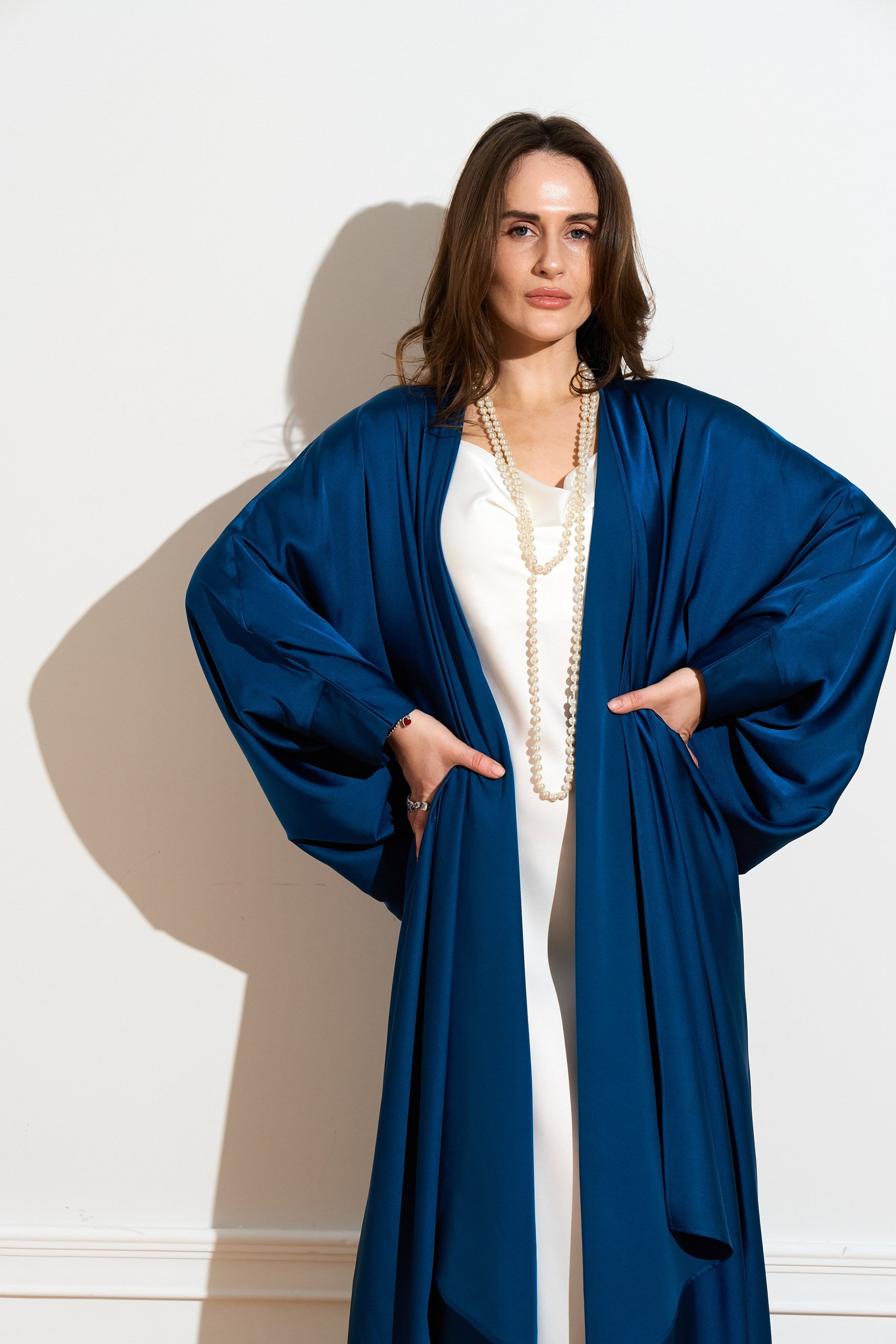 Silk abaya cape in Deep Blue color from the front close up 