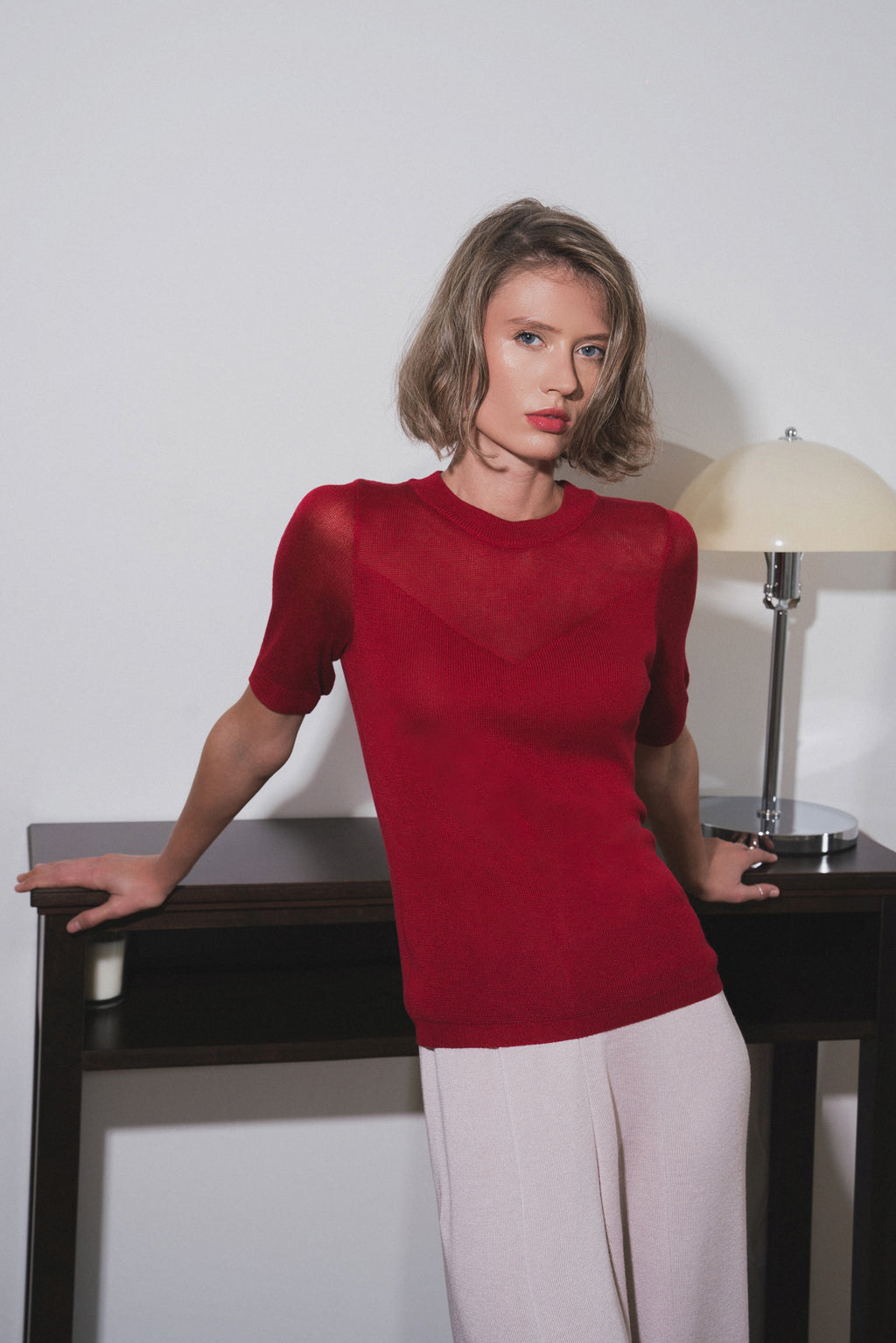 Burgundy knit top for women with short sleeves and sheer neckline 