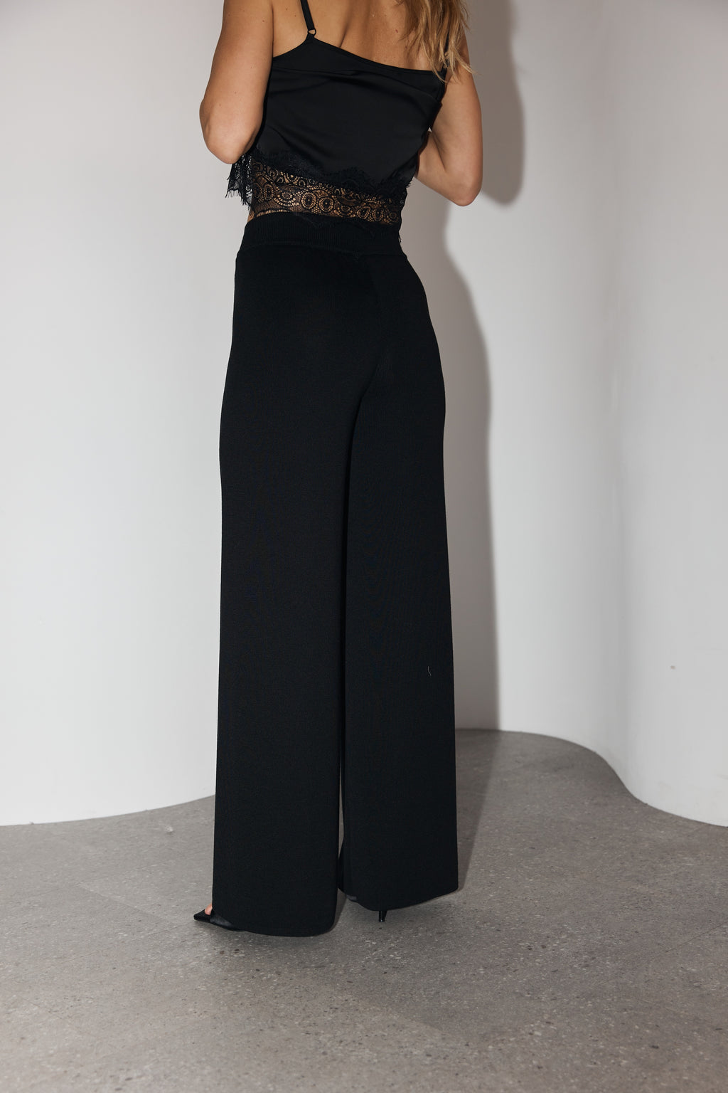 Andes Trousers in Black from the back
