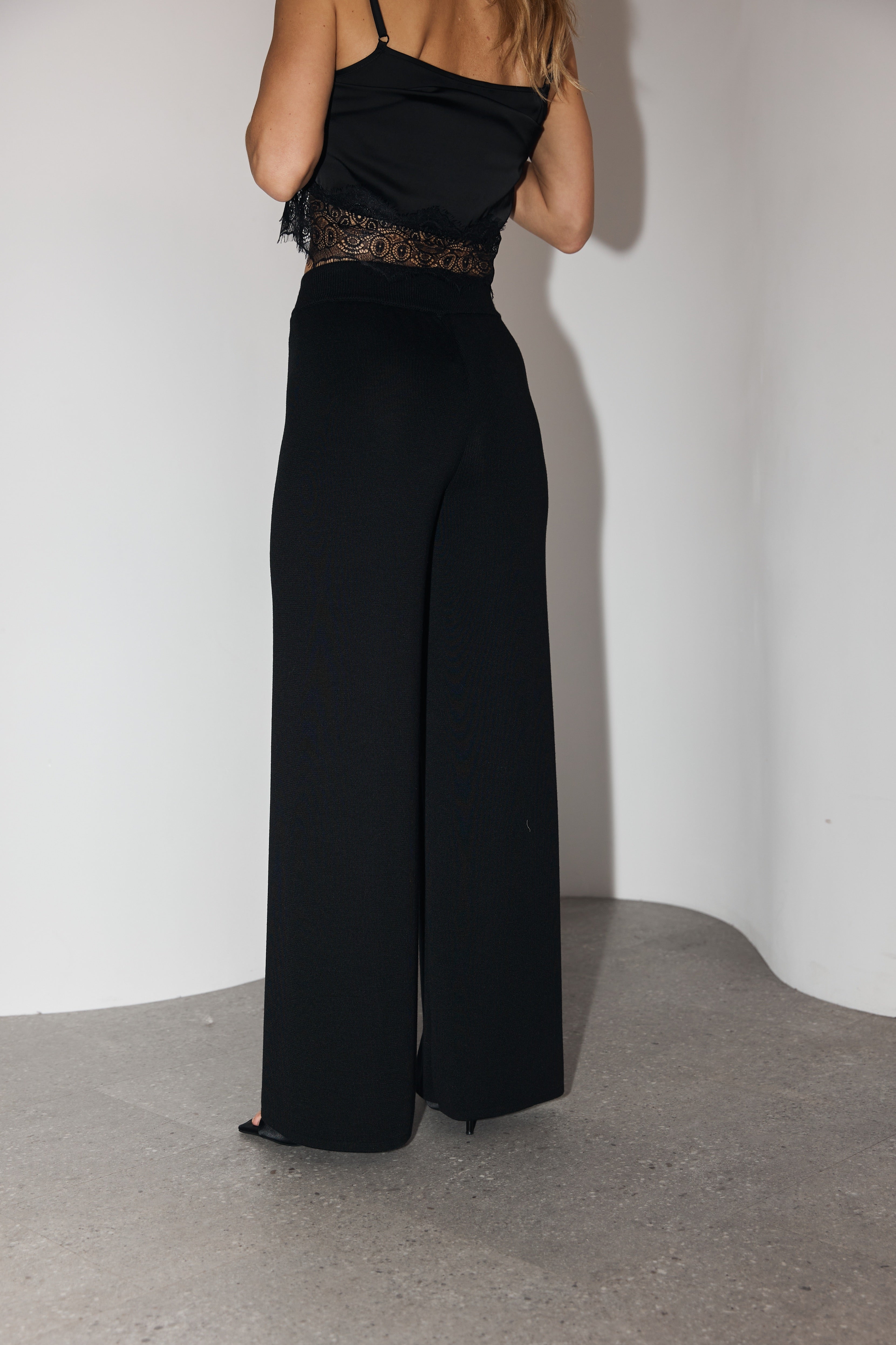 Andes Trousers in Black from the back